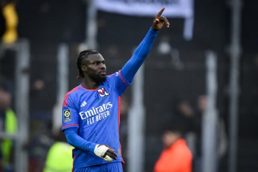 Mama Balde celebrates after scoring his first goal for Lyon