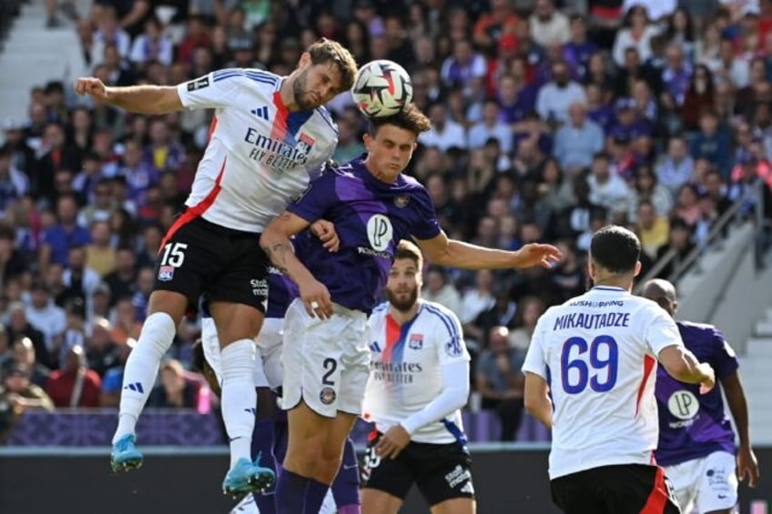 Lyon's American midfielder Tanner Tessmann (15) has earned a call-up to the USA national t