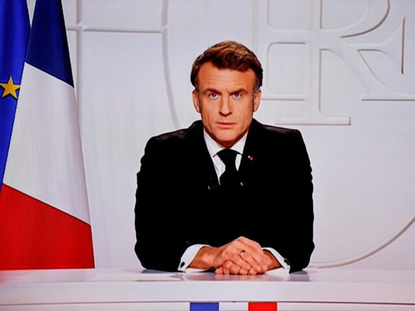 This photograph taken on March 5, 2025, shows a television screen broadcasting France's Pr