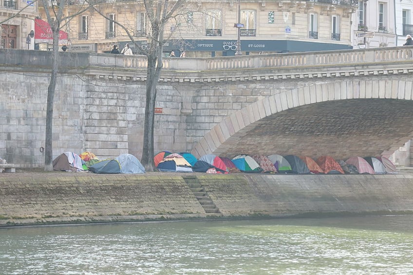 macron rejects own governments call for national referendum on migration