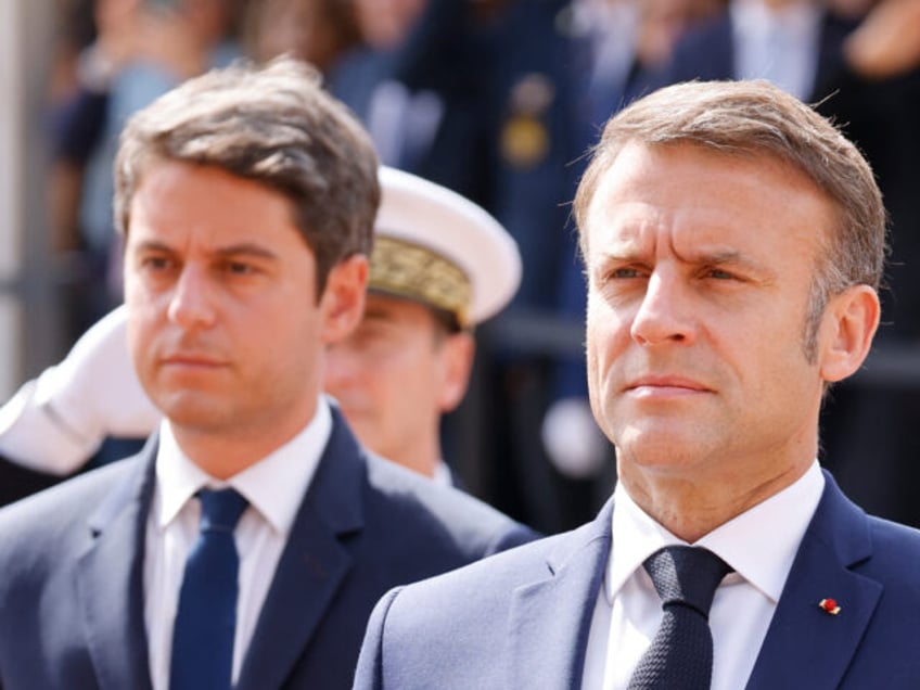 French President Emmanuel Macron (R) and France's Prime Minister Gabriel Attal attend a ce