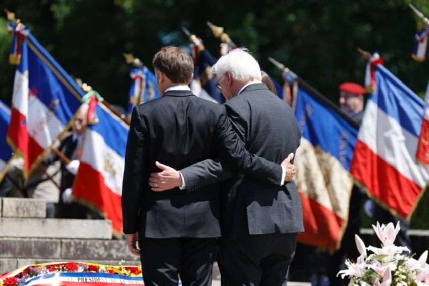 French President Emmanuel Macron and German President Frank-Walter Steinmeier at a ceremon