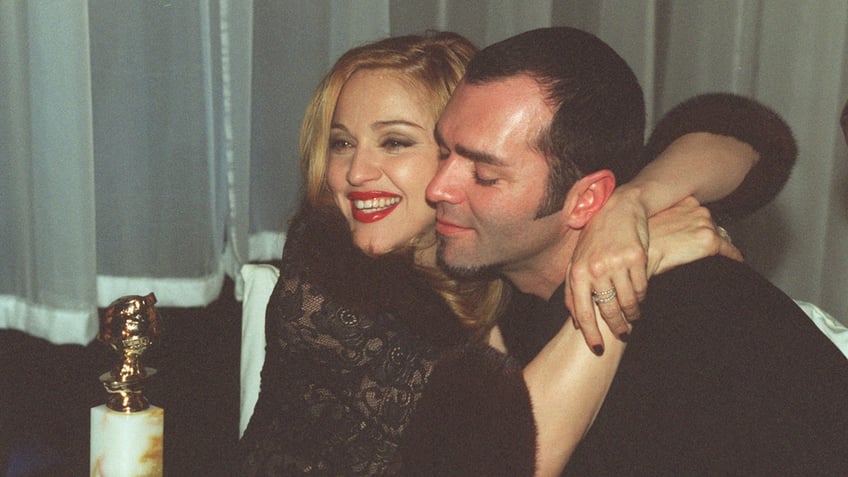 Madonna hugging her brother