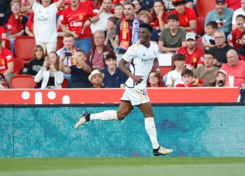 On target: Real Madrid's French midfielder Aurelien Tchouameni celebrates scoring