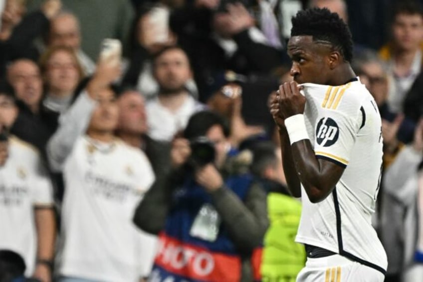 Real Madrid's Brazilian forward Vinicius Junior celebrates scoring the opening goal agains