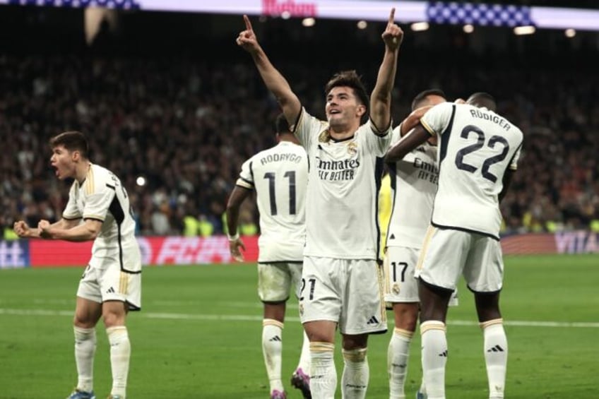 Real Madrid's Spanish midfielder Brahim Diaz celebrates scoring his team's third goal in the rout of Villarreal on Sunday