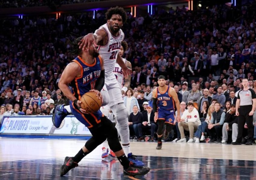 Joel Embiid (right) guards New York Knicks star Jalen Brunson in Tuesday's playoff battle