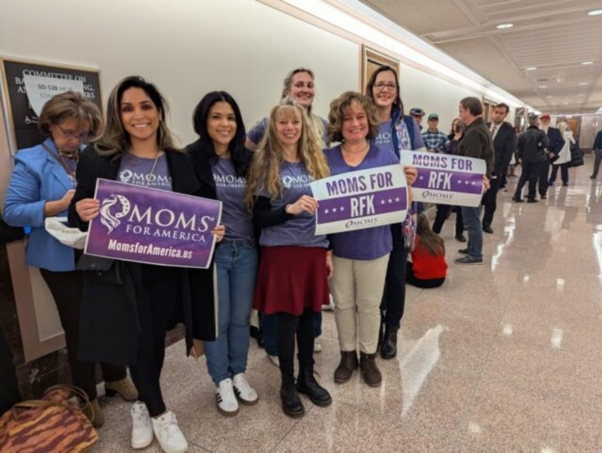 Chana Walker (3rd L) poses with members of "Moms for America" at the US Senate on Capitol