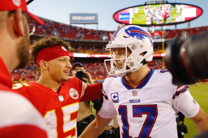 Patrick Mahomes of the Kansas City Chiefs, left, shakes hands with Josh Allen of the Buffalo Bills, right, after Buffalo's NFL win in October but the friends and rivals will meet again Sunday in Buffalo for a berth in the AFC Championship game