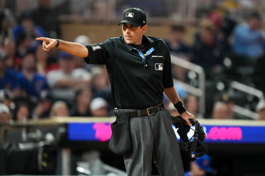 Umpire Pat Hoberg looks on during a game between the Minnesota Twins and Chicago Cubs on May 12, 2023 at Target Field in Minneapolis, Minnesota.