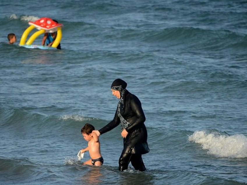 majority of french public backs burkini ban poll finds