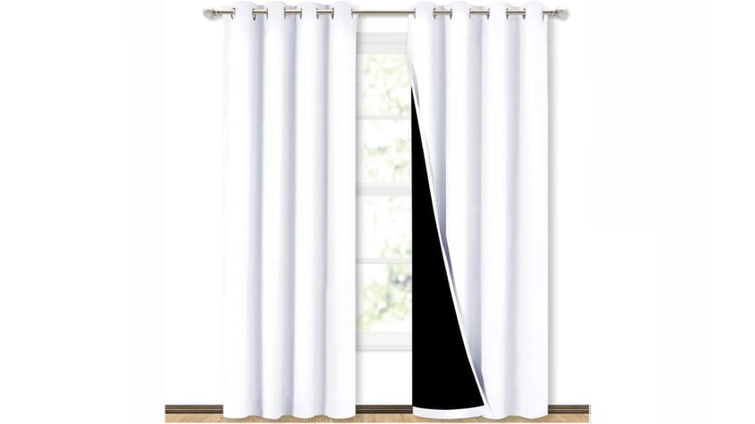 Block out light and trap heat with thermal curtains. 