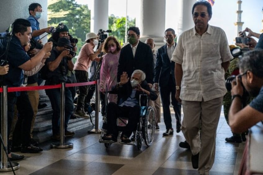 Malaysia's former finance minister Daim Zainuddin arrives in court on January 29, 2024