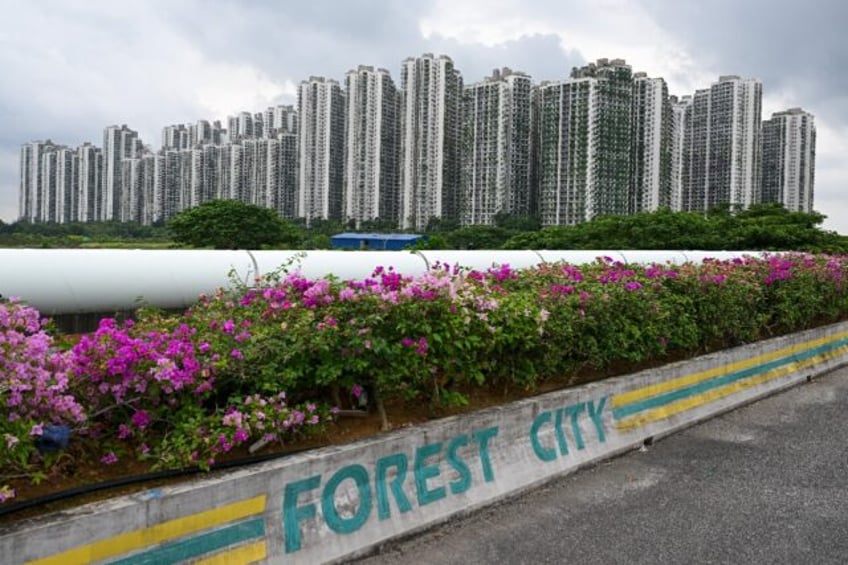 malaysias forest city teeters over china property giant woes