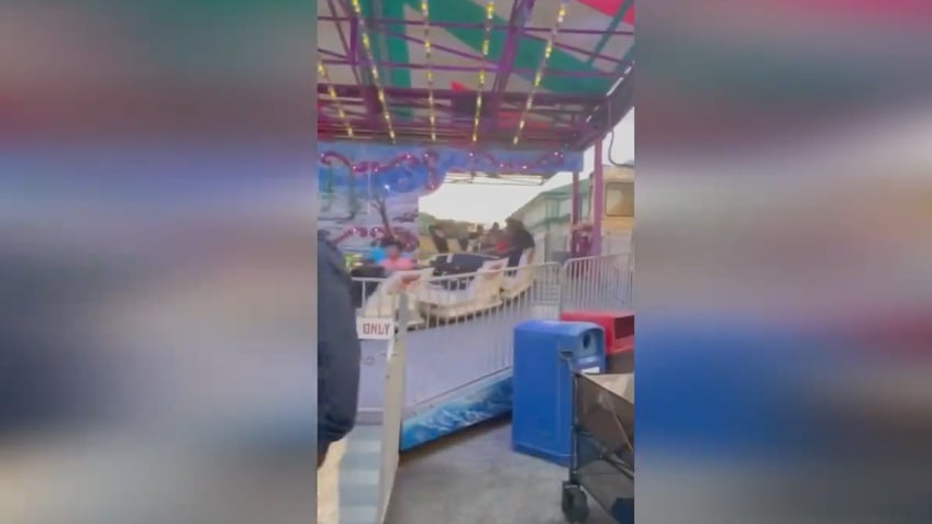 malfunctioning new york amusement park ride sends guests spinning backward as workers scramble to shut it off