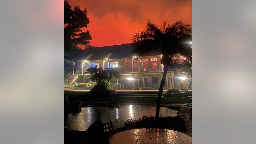 Exterior shot of Jane Seymour's home with a red/orange sky