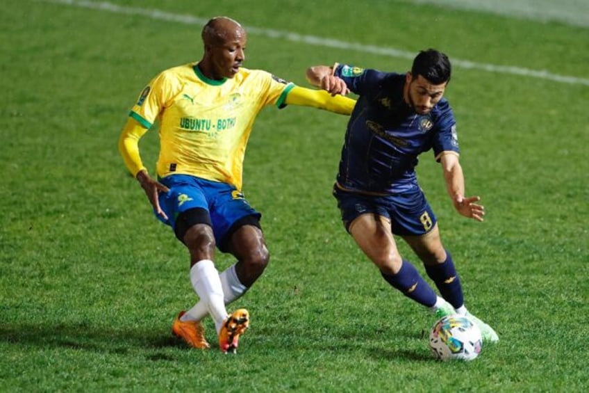 Mamelodi Sundowns defender Khuliso Mudau (L) was sent off in a 1-0 CAF Champions League lo