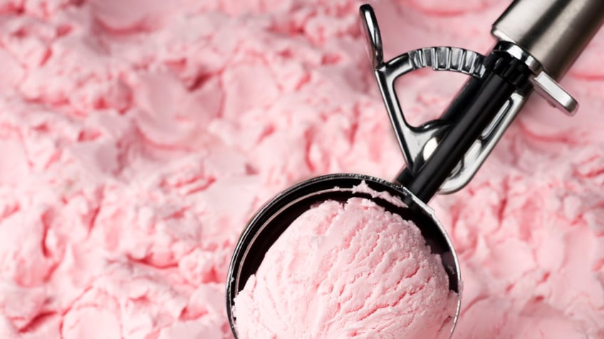 strawberry ice cream being scooped