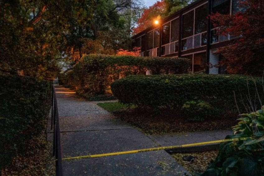 Police tape blocks the area where a Detroit synagogue leader was found dead on October 21, 2023