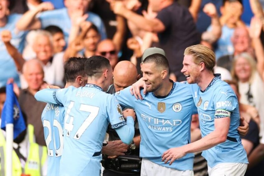 Mateo Kovacic (2nd right)scored in Manchester City's 2-0 win at Chelsea