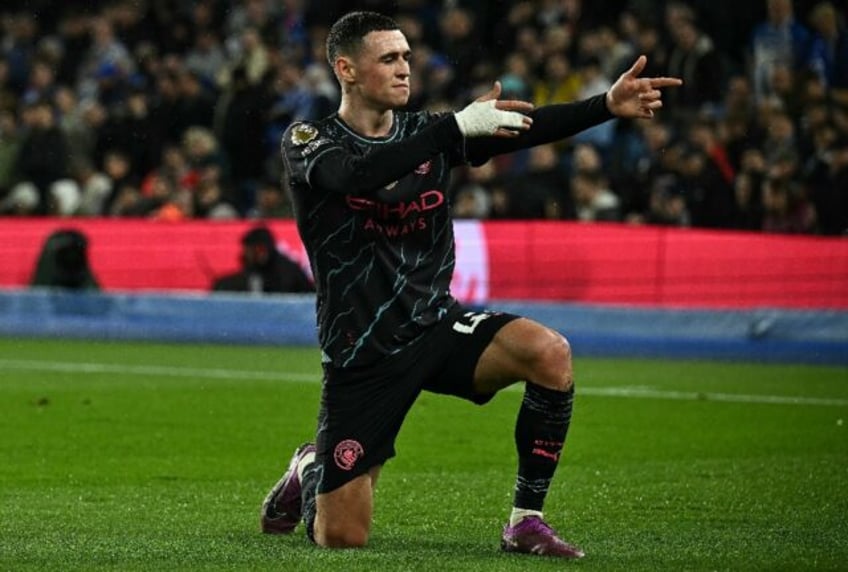 Manchester City's Phil Foden celebrates scoring against Brighton