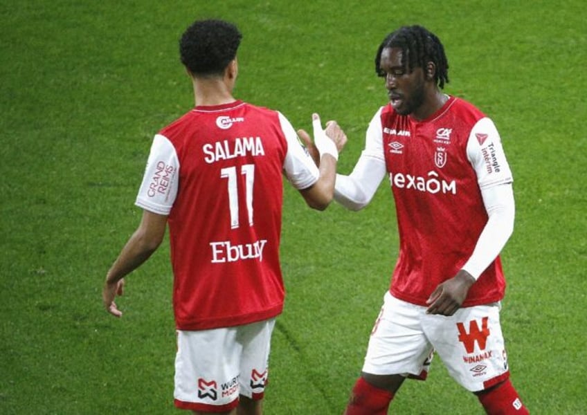 man city loanee takes reims up to fourth in ligue 1