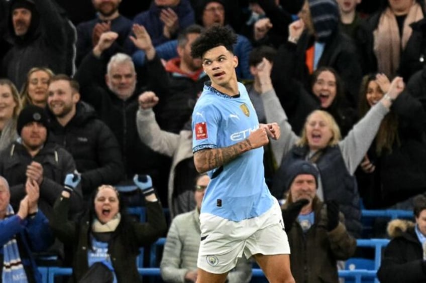 Manchester City's Nico O'Reilly celebrates scoring against Plymouth