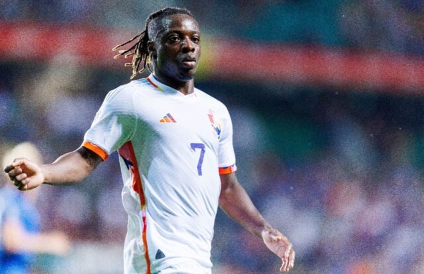 man city swoop for belgian winger doku