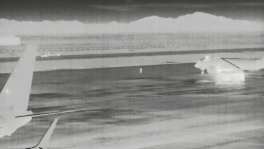 man running on tarmac
