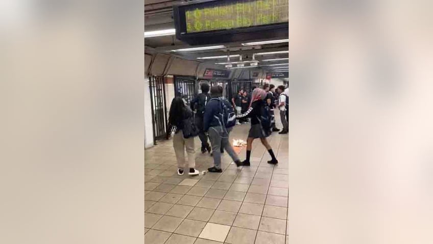 man lights newspapers on fire in nyc subway throws at other riders including kids video