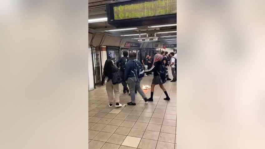 man lights newspapers on fire in nyc subway throws at other riders including kids video