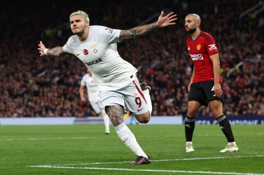 man utd arsenal rocked in champions league as real madrid edge napoli