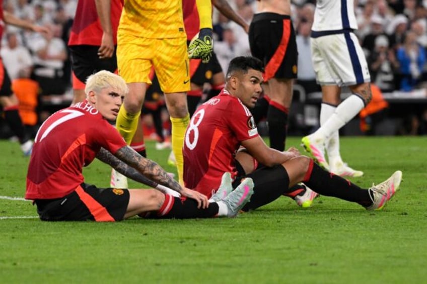 Manchester United's Alejandro Garnacho (left) and Casemiro react after their defeat to Tot