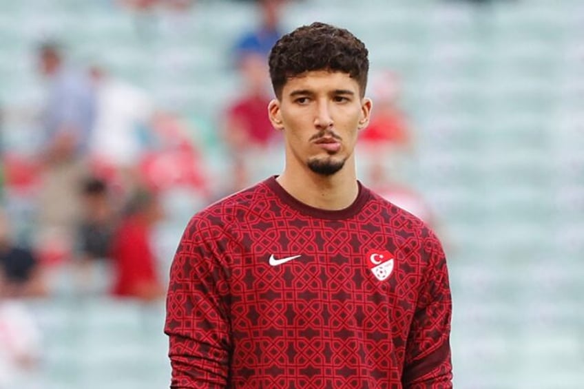 man utd sign turkey keeper bayindir loan reguilon from spurs