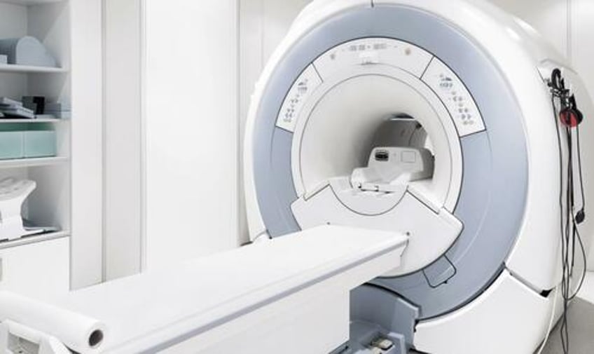 man with metal neck chain critically injured after being sucked into mri on long island