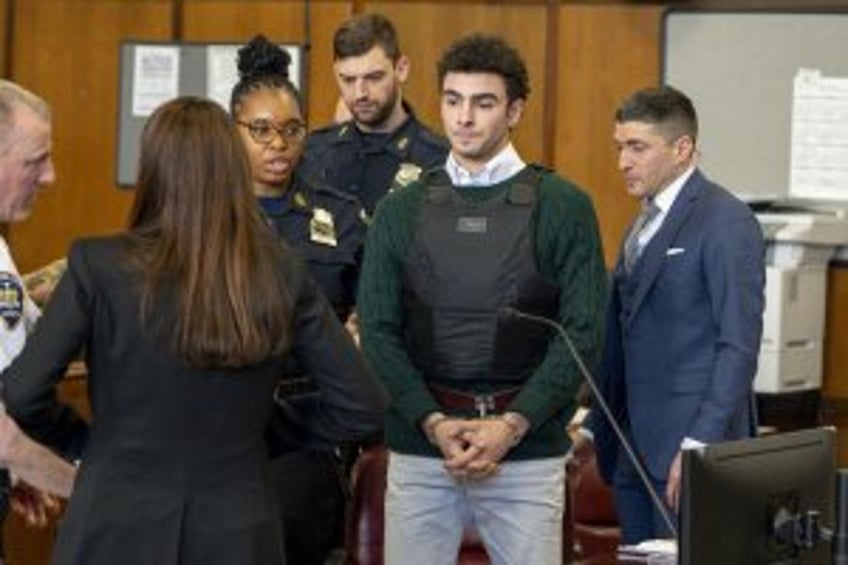 Mangione's attorneys ask court to remove shackles, body armor
