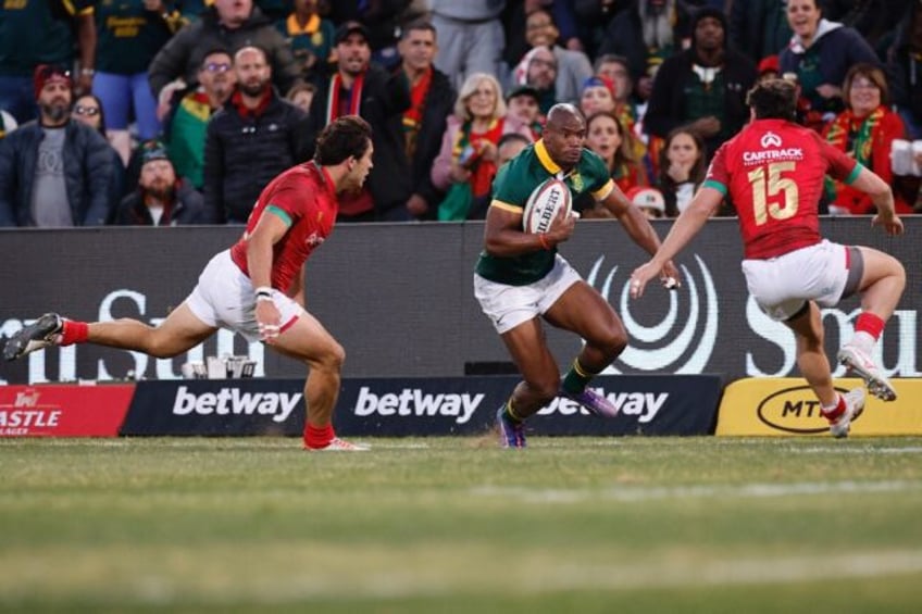 South Africa winger Makazole Mapimpi (C) scored three tries against Portugal in Bloemfonte