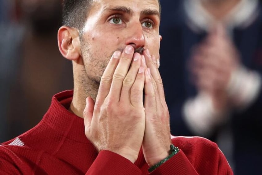 Late show: Novak Djokovic celebrates after winning against Lorenzo Musetti in the early ho