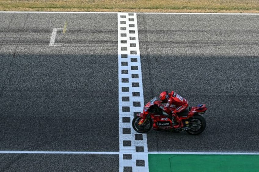 Ducati's Marc Marquez crosses the finish line to win the MotoGP Thailand