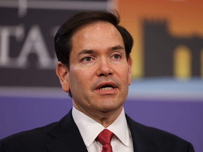 US Secretary of State Marco Rubio talks to the press during an informal meeting of The Nor