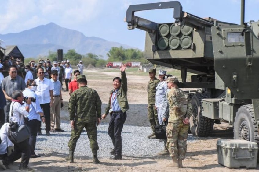 Philippine President Ferdinand Marcos inspecting a high mobility artillery rocket system o