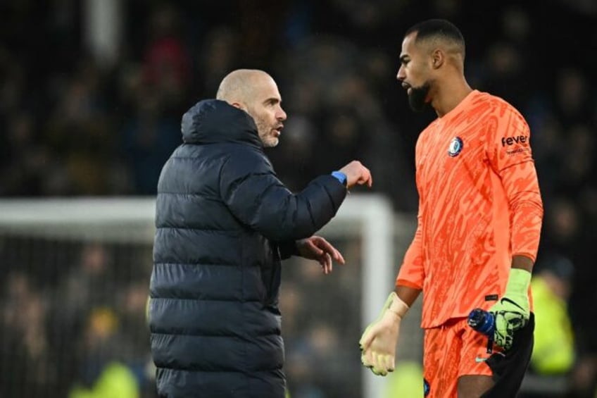 Pleased with a point: Chelsea coach Enzo Maresca (L) speaks with goalkeeper Robert Sanchez