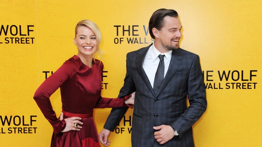 Margot Robbie and Leonardo DiCaprio attend the premiere of Wolf of Wall Street