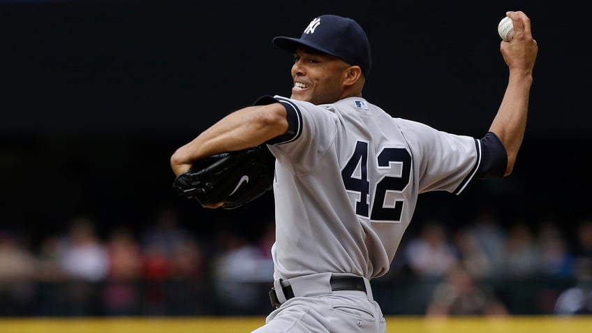 New York Yankees closing pitcher Mariano Rivera throws in the ninth inning of a baseball game against the Seattle Mariners, Sunday, June 9, 2013, in Seattle. Rivera earned the save as the Yankees defeated the Mariners 2-1. (AP Photo/Ted S. Warren)