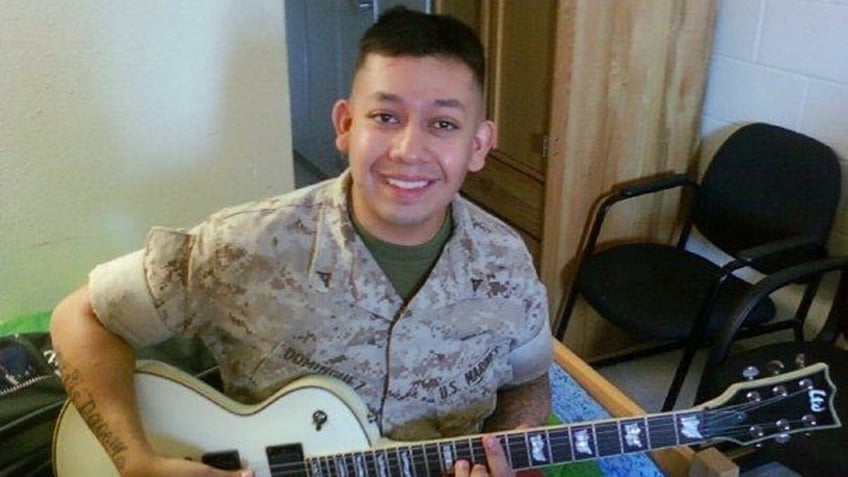 marine-playing-his-guitar