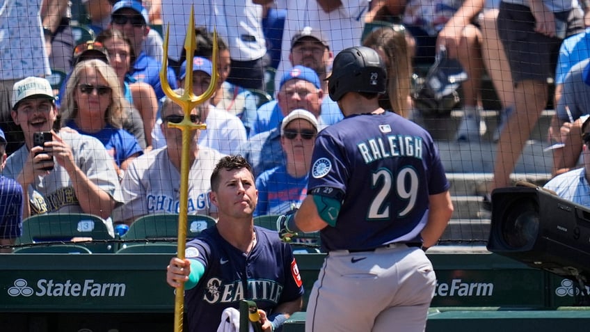 Cal Raleigh celebrates