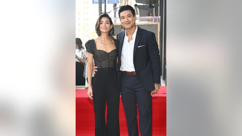 Mario Lopez and his wife