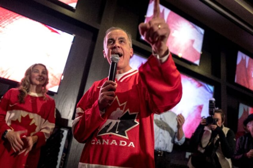 Canada's incoming prime minister Mark Carney speaks at a hockey watch party in Ottawa in F