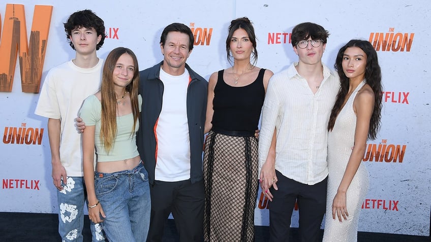 Mark Wahlberg and his wife Rhea appear on the red carpet with his son Brendan, daughter Grace, son Michael and his girlfriend