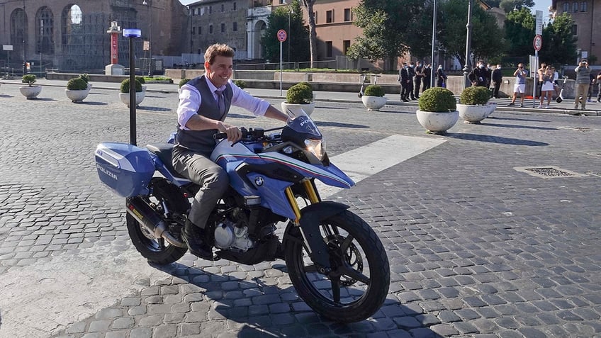 Tom Cruise riding a motorcycle